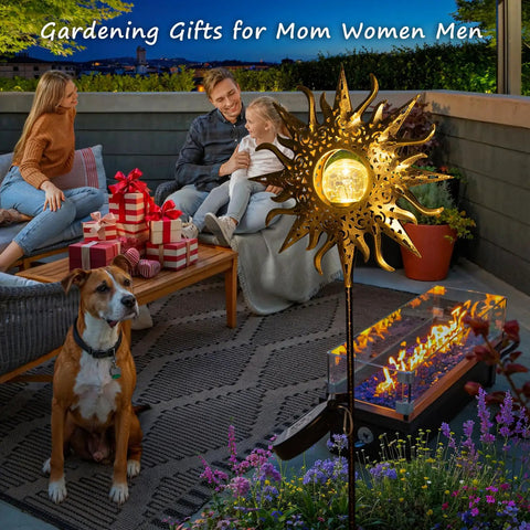 Sun Powered Solar Garden Light Stake With Crackle Glass Metal Finish beside family on patio, dog in foreground