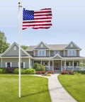 Heavy Duty 25 Foot Flag Pole Kit With 3x5 Foot US Flag Aluminum Outdoor Flagpole With Gold Ball Top in front of house