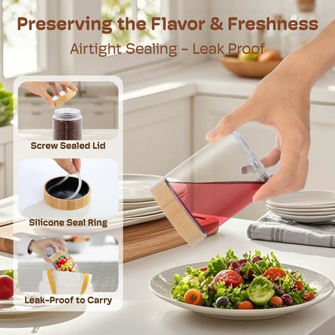4 Pack 10oz Glass Meal Prep Jars with Bamboo Lids being used for pouring dressing over salad