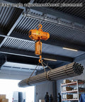 Four Wheel Strut Channel Trolley Hoist With 360 Degree Rotating Bearing Rollers suspending pipes in warehouse