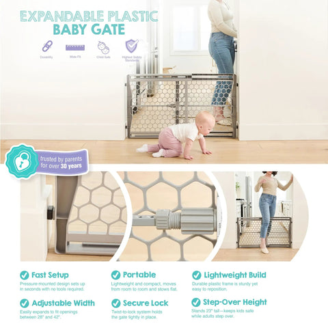 Expandable Baby Gate 28 To 42 Inch Wide For Doorways And Bottom Of Stairs Pressure Mounted Safety Gate For Babies Toddlers And Pets Tested And Safe For 30 Years American Designed And Owned, shown with toddler