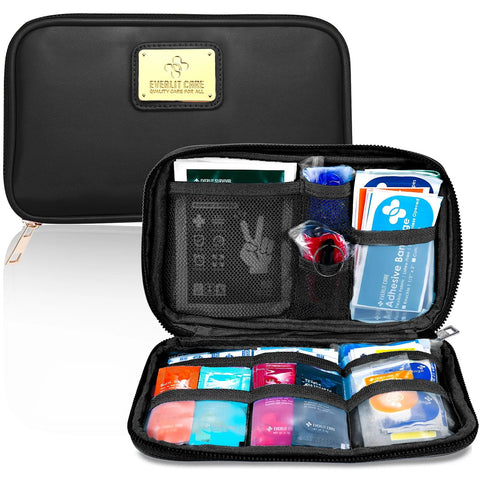 Black Everlit Care car first aid kit in zippered case; opened view shows mesh pockets and assorted medical supplies.