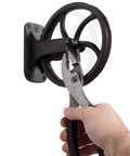 Heavy Duty Cast Iron Vintage Industrial Wheel Pulley Wall Mount For Farmhouse Lamps And Pendant Fixtures, 6.75 Inch Diameter, Black Finish, Old School Loft Vibe, DIY Ready Hanging Hardware being installed with pliers