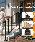 Straight Up Tough Wrought Iron Stair Handrail With Secure Balusters For Outdoor Deck And Concrete Steps Fits 3 To 4 Stairs Rust Proof Powder Coated Black Safety Railing on concrete stairs with person