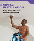 Premium Smoke And Carbon Monoxide Detector Hardwired With Aa Battery Backup 3 Pack shown during easy installation on ceiling.