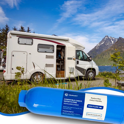 Two Pack RV Inline Water Filter System With Flexible Hose Protectors in front of a camper by a lake with mountains