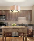 Oil Rubbed Bronze 4 Light Iron Pendant Light with Adjustable Height Scalloped Gray Linen Shade in kitchen setting