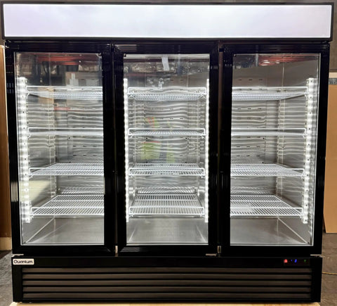 Heavy Hitter Commercial Merchandiser Freezer With Three Self Closing Glass Doors and Bulletproof Adjustable Shelving for No Nonsense Frozen Food Display In Busy Restaurants And Stores, showcasing empty shelves.