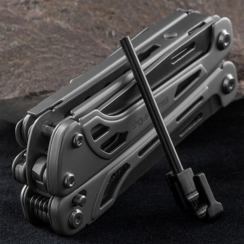Fortitude BF 206 17 In 1 Stainless Steel EDC Multi Tool Pocket Knife with nylon sheath placed on dark surface