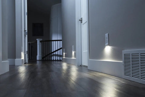 Hallway with Motion Detecting LED Night Light Built Into Wall Plate For Duplex Outlets With No Sweat Install Auto On Off Sensor