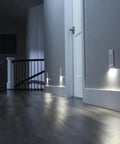 Two Pack MotionLight Built In Wall Plate LED Night Lights For Duplex Outlets illuminating hallway with auto sensor