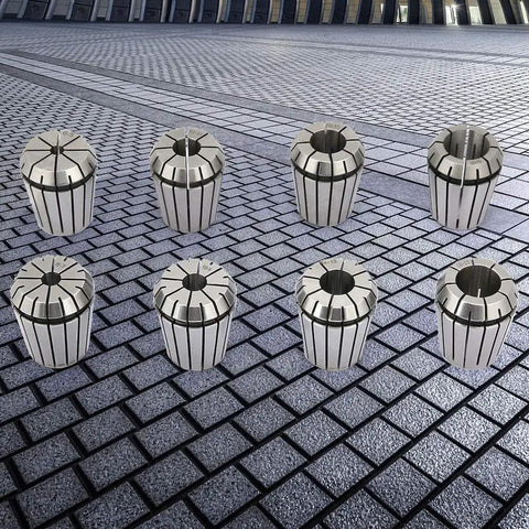 Total Beast Eight Piece Manganese Steel Er32 Precision Spring Collet Kit For Cnc Milling Lathe Engraver Rigs showing eight collets on pavement.