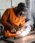 Welder wearing Leather Welding Jacket With Cape Sleeves And Bib Apron Top Notch Pro Grade Welder Safety Coat in action