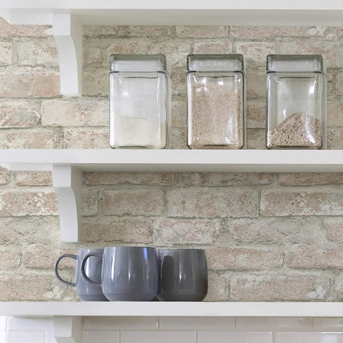 Denver Brick White Washed Peel And Stick Wallpaper behind kitchen shelves with jars and mugs