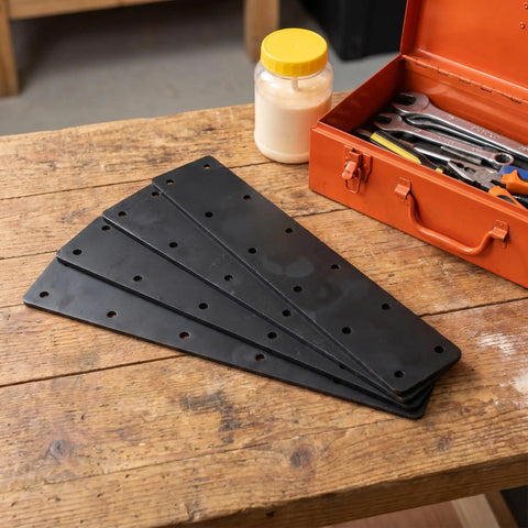 Heavy Duty Stainless Steel Flat Brace Bracket Set 4 Pieces on a wooden table with tools beside them