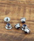 20 Piece M6 Self Locking Nut Set With Flange, 304 Stainless Steel Nylon Insert Anti Loosening Nuts, Bright Finish on wood surface