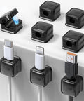 8 Pack Cord Organizer Holders with strong adhesive magnetic cable management for desk, securing USB, Type C, Lightning cables.