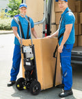 Sturdy Electric Stair Climbing Cart With Heavy Duty Handle For Moving Furniture And Appliances Fast Folding Design being used by workers to load a box.