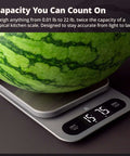 Digital food scale weighing watermelon, featuring stainless steel platform and high-definition LCD for Beast Mode Kitchen Scale For Bulk Cooking 22 Pound Digital Food Scale With 1 Gram Precision