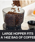 Hella Precise Automatic Coffee Grinder With Built In Scale And Thirty Nine Custom Settings For Bang Perfect Home Brews Solid Daily Ritual With Fourteen Oz Bean Hopper Sleek Black Design with large hopper filled with coffee beans.