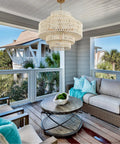 Huge White Rattan Chandelier With 6 Lights Hand Woven 5 Tier Pendant Light in a sunroom setting, adjustable height up to 70 inches.