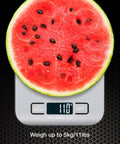 Digital Kitchen Scale With Precise Tare And Multi Unit Readouts That Makes Measuring Up To 11 Lbs A Breeze For KG G LB OZ ML Battery Powered With Two AAA Included Ideal For Portion Control Cooking And Meal Prep showing watermelon slice at 110g