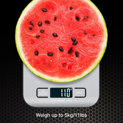 Digital Kitchen Scale With Precise Tare And Multi Unit Readouts That Makes Measuring Up To 11 Lbs A Breeze For KG G LB OZ ML Battery Powered With Two AAA Included Ideal For Portion Control Cooking And Meal Prep showing watermelon slice at 110g