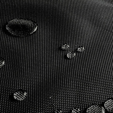 Waterproof surface of Heavy Duty EV Charger Tote Bag Made Tough With Ripstop Oxford Fabric showing water droplets.