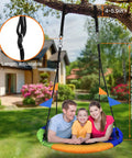 Family on colorful 40 Inch Saucer Tree Swing Flying Saucer With 900 Pound Weight Capacity Colorful Safe Durable Seat Adjustable Multi Strand Ropes 2 Added Hanging Straps Sturdy Backyard Outdoor Swing For Kids And Families in backyard.
