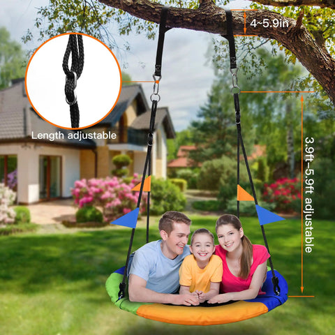 Family on colorful 40 Inch Saucer Tree Swing Flying Saucer With 900 Pound Weight Capacity Colorful Safe Durable Seat Adjustable Multi Strand Ropes 2 Added Hanging Straps Sturdy Backyard Outdoor Swing For Kids And Families in backyard.