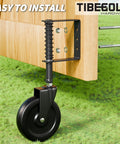 Spring Loaded 5 Inch Gate Caster Wheel For Outdoor Wood Gates And Fences Built Tough Heavy Duty 360 Degree Swivel Anti Sag Gate Kit 220 Lb Capacity Black Gate Support Wheel 1 Pack mounted on wooden gate.