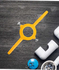 Hardcore Pipe Threader Kit For Plumbing Projects featuring a yellow pipe threading tool and white PVC fittings on black background