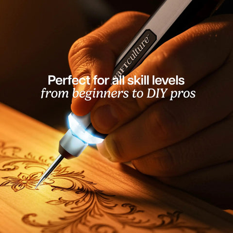 Close-up of engraving pen for metal, wood, glass, plastic, and all materials with bright LED light engraving intricate wood design.