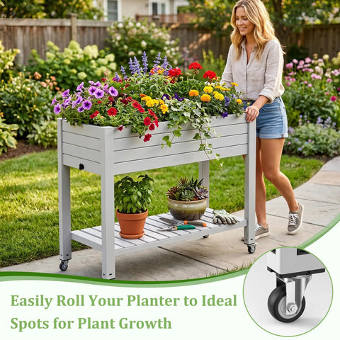 Raised Garden Bed On Wheels With Storage Shelf And Water Level Monitor in backyard with colorful flowers and woman pushing