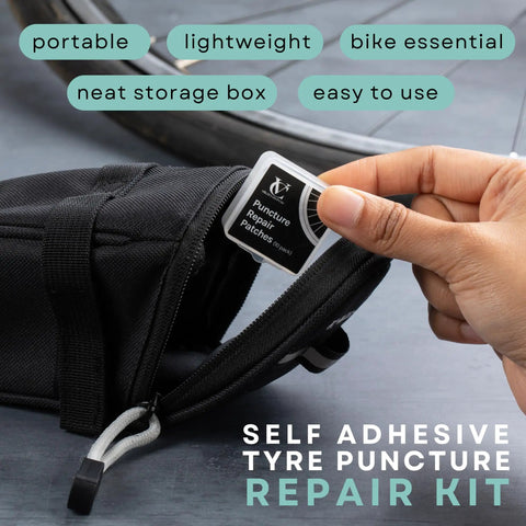 Hand holding self-adhesive tire puncture patch from Bike Puncture Repair Kit with Self Adhesive Tire Patches for Road MTB BMX and EBikes.