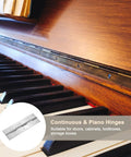 Six Inch Stainless Steel Piano Hinges Two Pack Badass Continuous Cabinet Door Hinge displayed on a piano, showing pre-drilled holes.