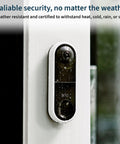 Essential Wired Video Doorbell With HD Video, 180 Degree View, Night Vision mounted on wall in rain showing durability