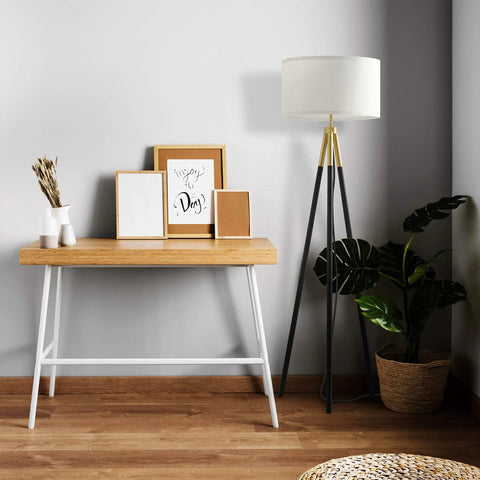 Levi LED Floor Lamp With Tall Black And Gold Tripod For A Dope Living Room Vibe Modern Decor Next To Wooden Console Table