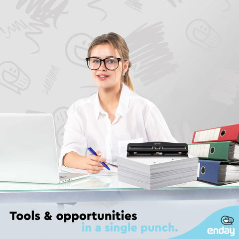 Woman at desk with heavy duty three hole punch for binders, adjustable 10 sheet paper punch, next to binders and paper stack.