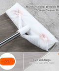 Long-Handle Window Screen Cleaning Brush for home windows with white multi-brush head and durable grip shown on surface.
