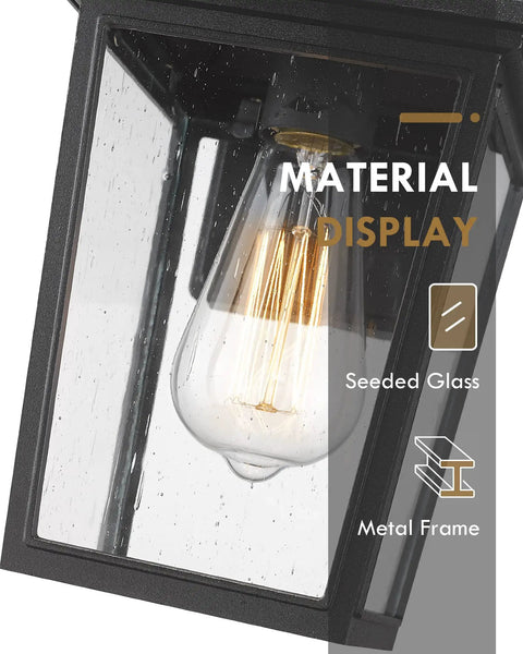 Close-up of Two Pack Outdoor Wall Lanterns With Seeded Glass Industrial Matte Black Sconce Lights For Front Porch Patio Balcony And Indoor Use Weatherproof Wet Location Rated ETL Listed showing seeded glass and metal frame