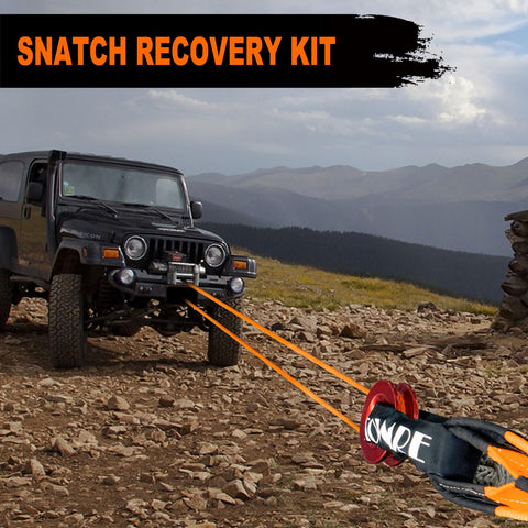 Jeep on rough terrain using Snatch Block Ring Winch Pulley Kit With Two Piece One Half Inch Soft Shackle And Three Inch By Eight Foot Tree Saver Recovery Strap For Off Road ATV UTV Truck