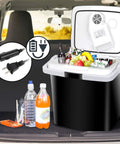 Portable 26 Liter Car Cooler Warmer With Ac Dc Power compact electric refrigerator chest in a car with drinks and fruits.