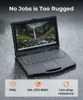 Built Like A Tank 15.6 Inch Rugged Laptop Running Windows 11 Pro powered by Intel Core i5 on a wet surface with rain.