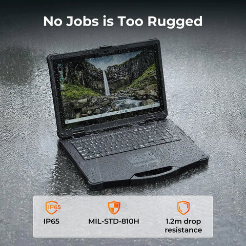Built Like A Tank 15.6 Inch Rugged Laptop Running Windows 11 Pro powered by Intel Core i5 on a wet surface with rain.