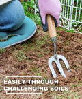 Versatile Weeding Fork Hand Tool with a 12 Inch Wood Handle and 3 Pointed Tines used for gardening in hard soil