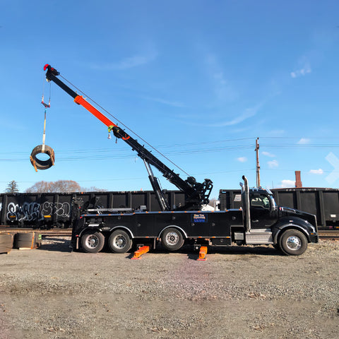 Powerlift Green Polyester Endless Round Sling 6 Feet Long With 5300 Lb Vertical Capacity in use on a crane lifting straps