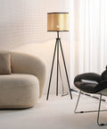 Mid Century Bohemian Tripod Floor Lamp With PVC Rattan Shade And Velvet Rim in modern living room setting