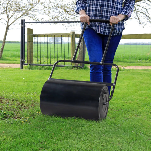 Lawn Roller Heavy Duty For Seedbed Prep, No Fuss Push Or Tow Behind Sod Roller With U Shaped Handle, Water Or Sand Filled Drum, 19.5 Inch Garden Roller For Lawn, Backyard And Garden Care, Black being used on lawn
