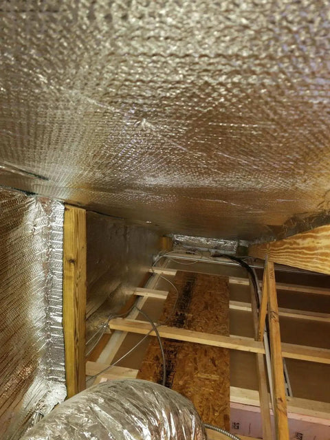 Reflective Foil Insulation Spiral Duct Pipe Wrap Double Bubble 4 Inch By 10 Foot R8 With Taped Seams installed in attic